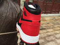 Air Jordan 1 High Sneakers in Black Red White - product image from the listing.