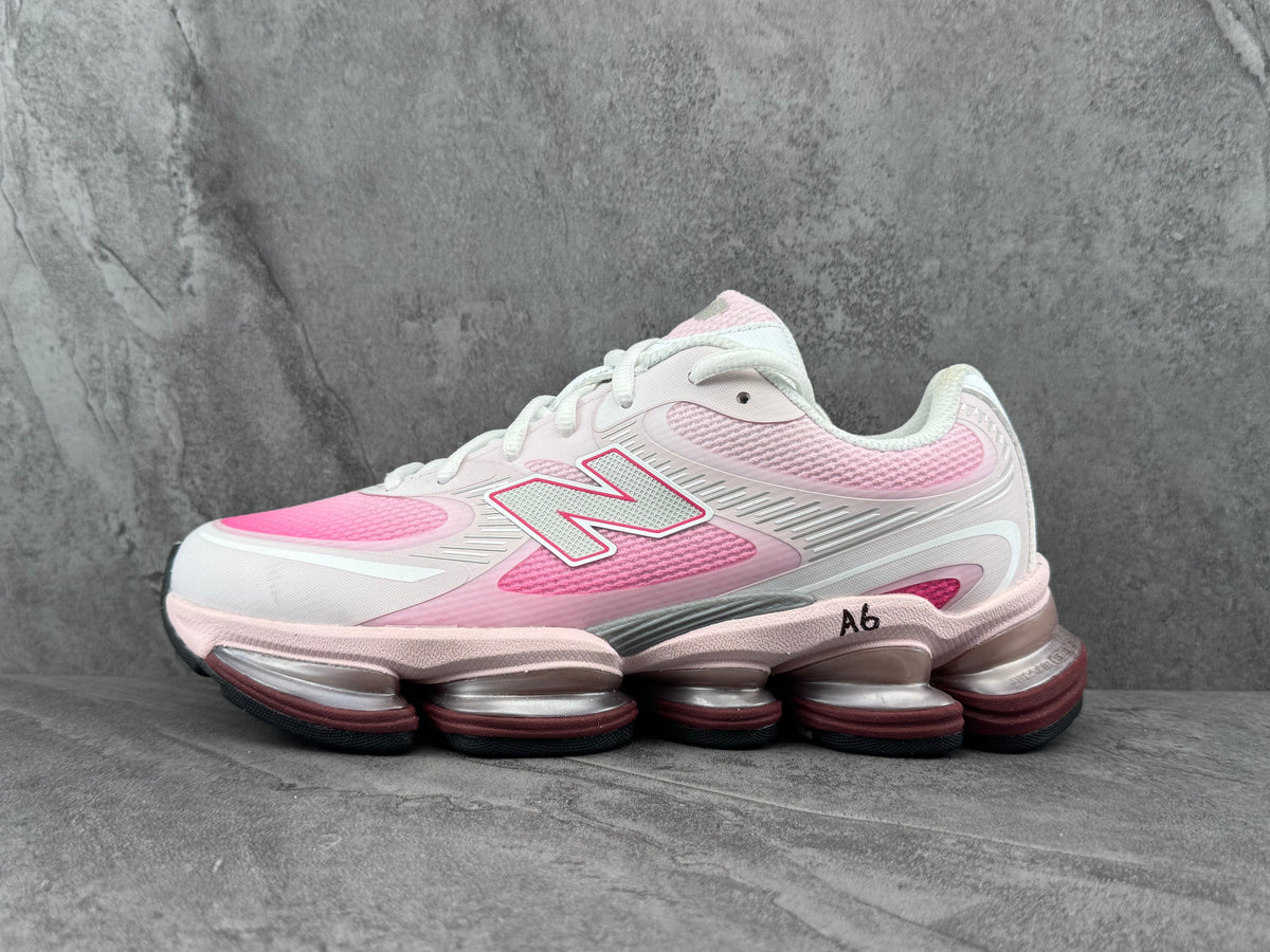 New Balance Pink and White Running-Style Trainers - product image from the listing.