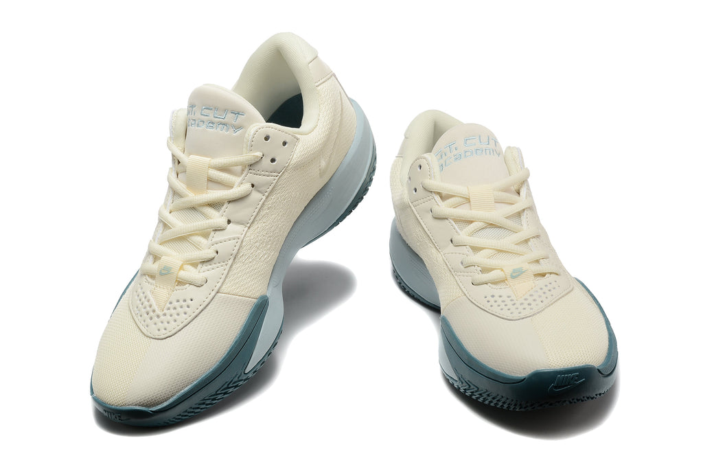 Nike G.T. Cut Academy Basketball Shoes, in Sail and Blue - product image from the listing.