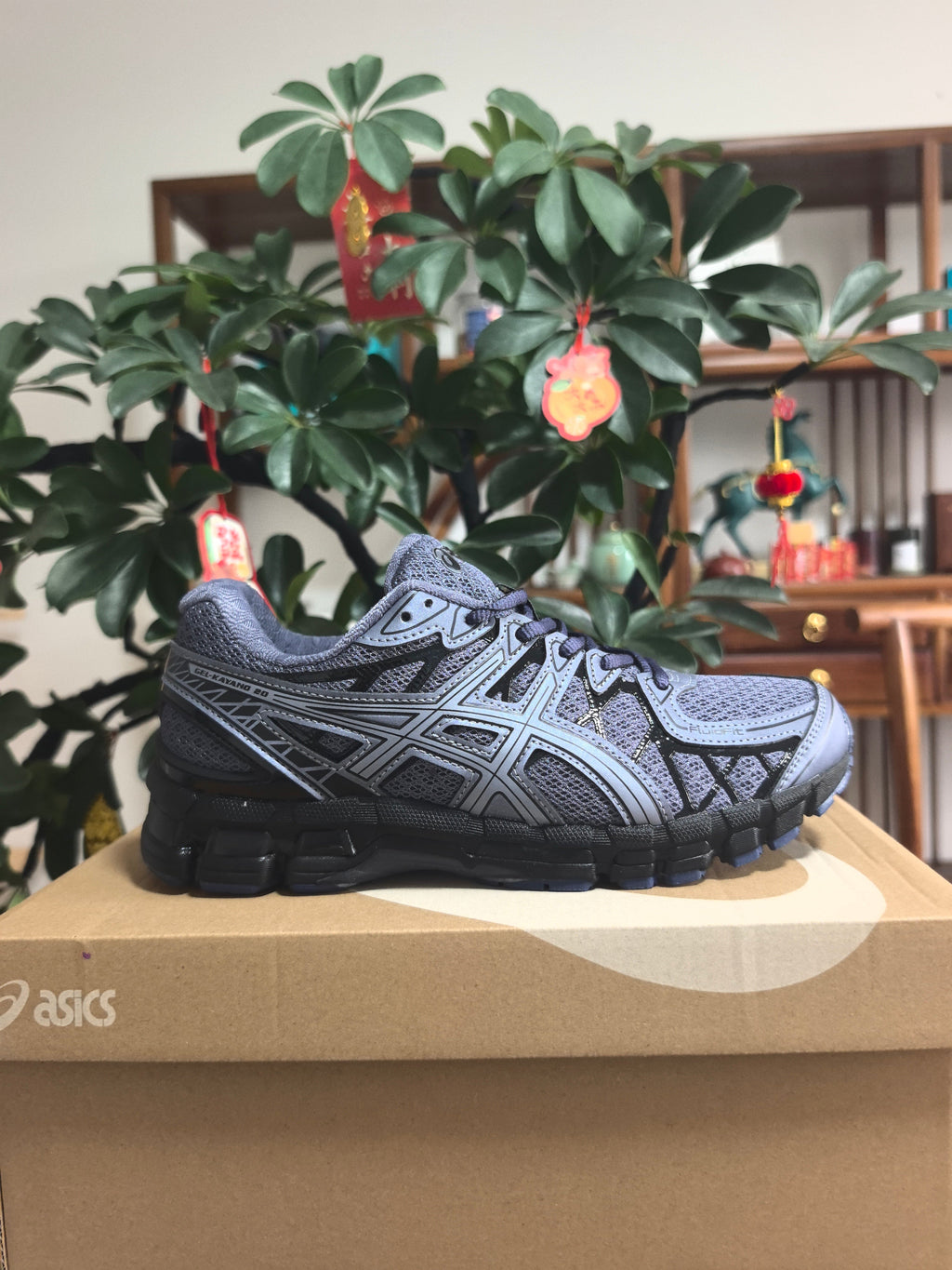 ASICS GEL-KAYANO 14 Sneakers in Blue Black - product image from the listing.