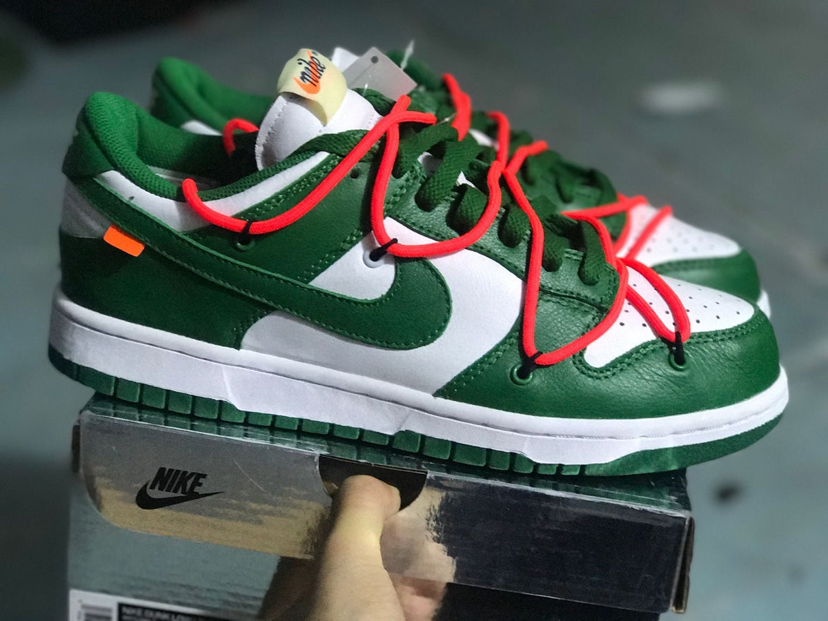 Nike Dunk Low White Pine Sneakers in Green CT0856-100 - product image from the listing.