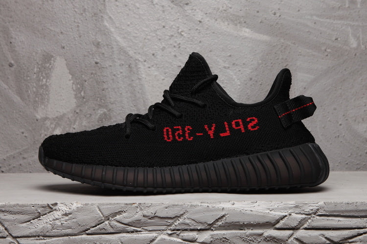 adidas Yeezy Boost 350 V2 Sneakers in Black - product image from the listing.
