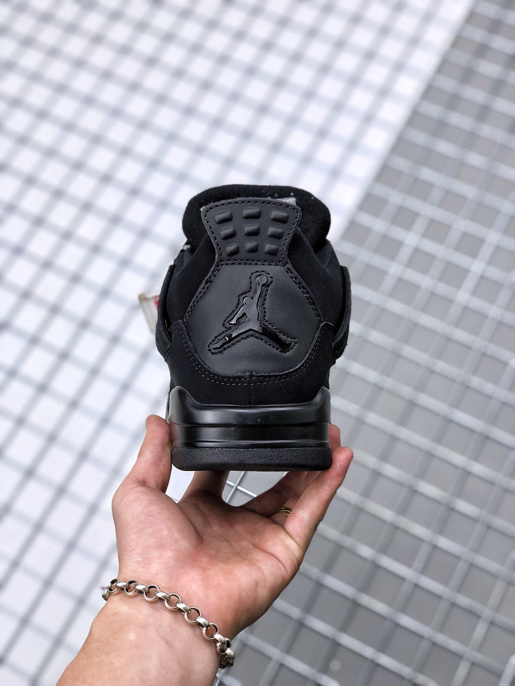 Air Jordan 4 Black Cat Sneakers CU1110-010 - product image from the listing.