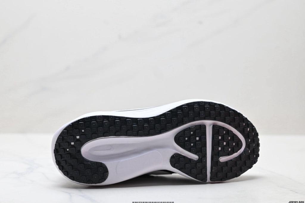 Nike Revolution 8 Running Sneakers in Black and White - product image from the listing.