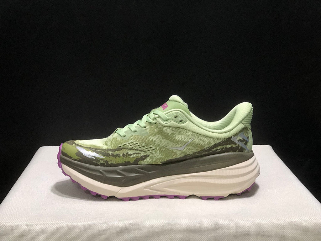 HOKA Stinson 7 Trail Running Shoes in Sage in Green - product image from the listing.