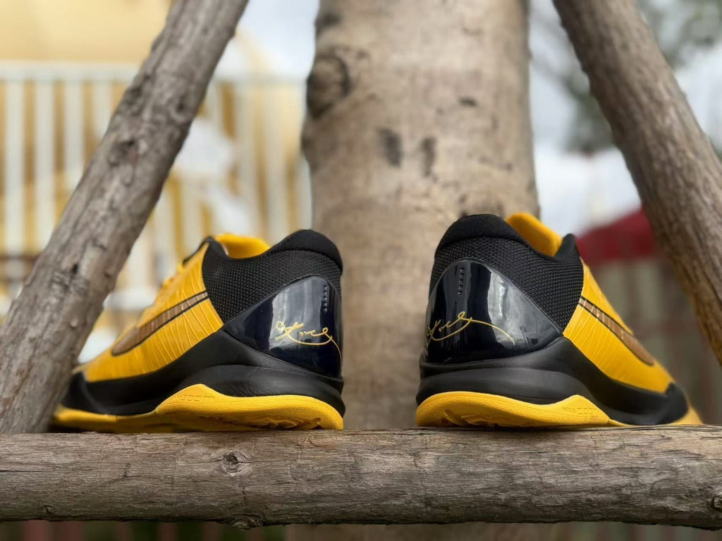 Yellow and Black Nike Kobe 5 Basketball Shoes - product image from the listing.