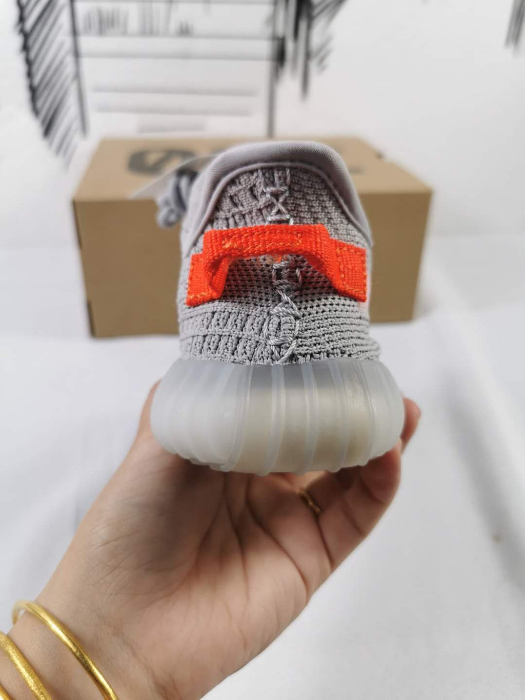 Light Grey and Coral Yeezy 350 V2 Kids Sneakers - product image from the listing.