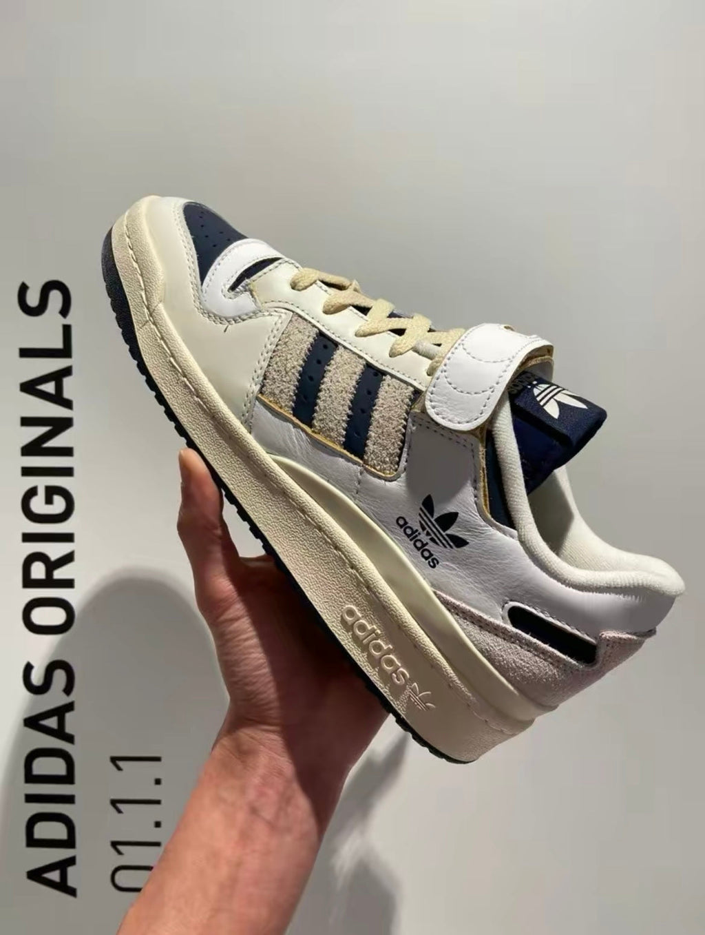 adidas Originals Forum 84 Low Sneakers in White Navy GZ6427 - product image from the listing.