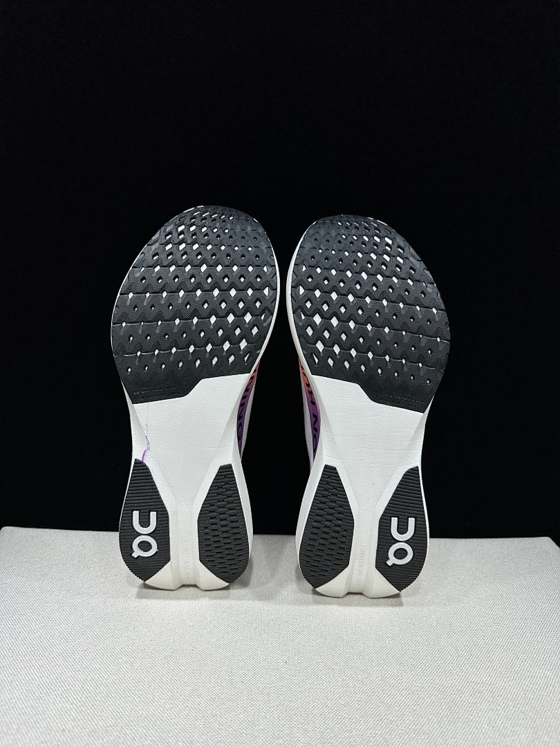 On Cloudboom Strike LS Running Shoes in White Purple - product image from the listing.