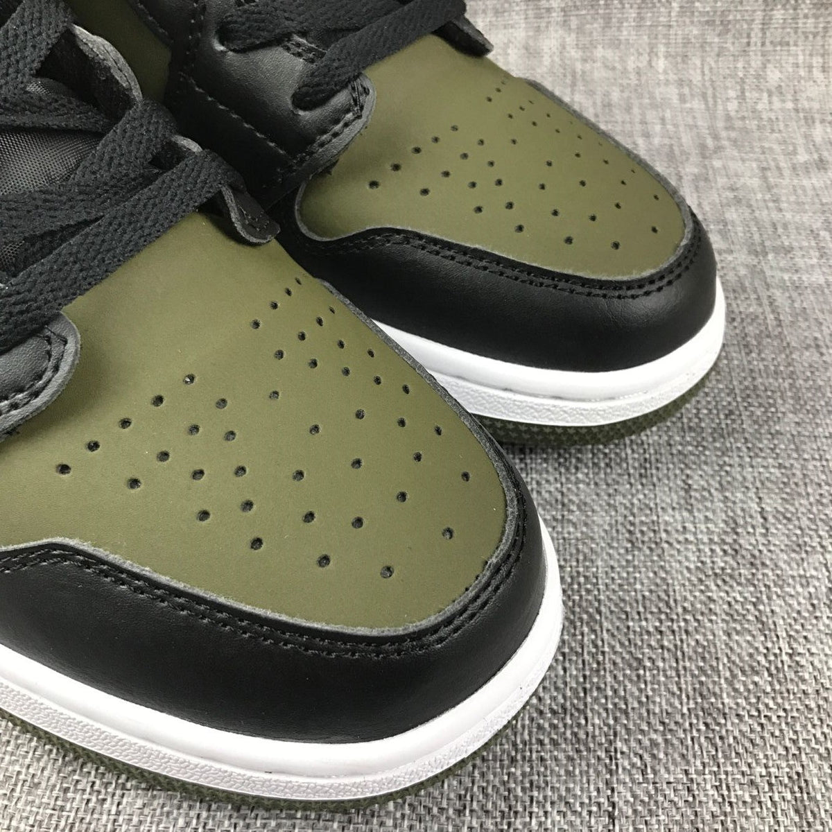 Black and Olive Green Jordan 1 Mid Sneakers - product image from the listing.