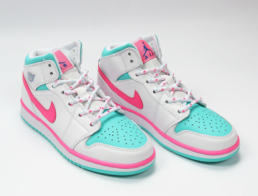 Jordan 1 Mid Sneakers in White Pink Aqua 555112-102 - product image from the listing.