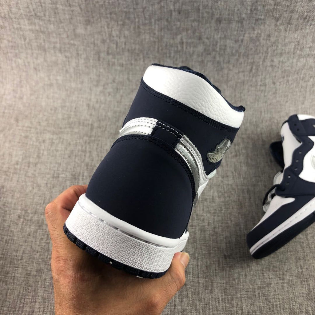 Air Jordan 1 Co.JP High Sneakers White Navy Silver DC1788-100 - product image from the listing.