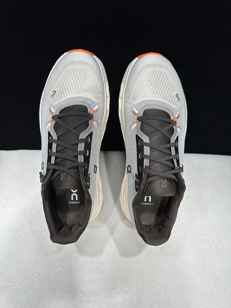 On Cloudtilt Trainers in Gray and Apricot - product image from the listing.