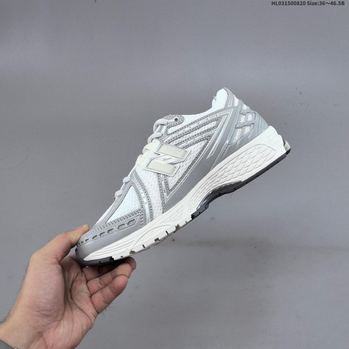 New Balance 1906R Sneakers in White Silver U1906RJM - product image from the listing.