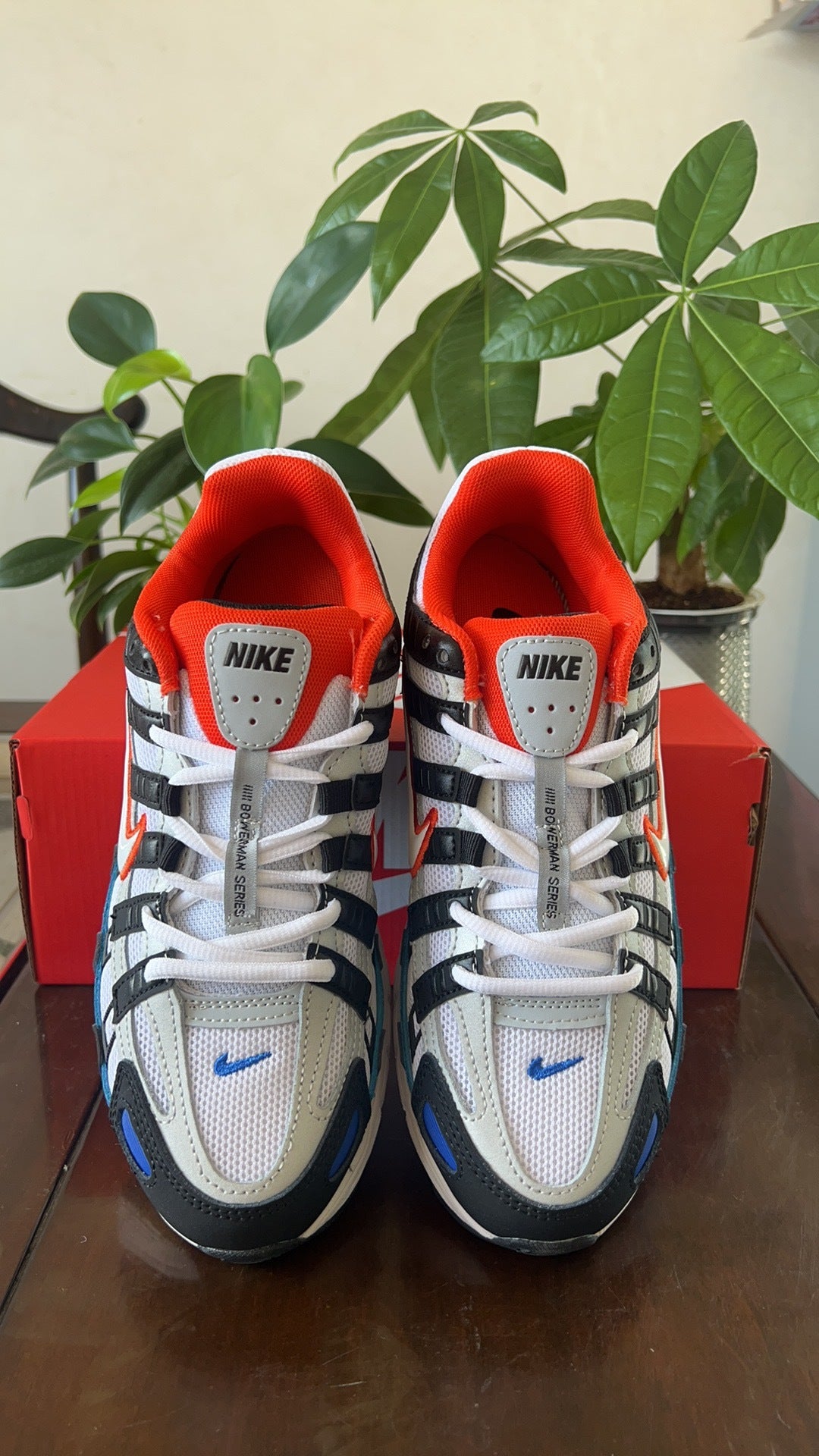 Nike P-6000 Sneakers in White Black Blue CD6404-008 - product image from the listing.
