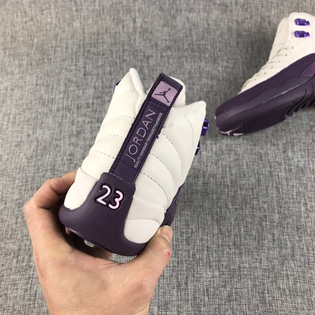 Air Jordan 12 White Purple Sneakers 510815-001 - product image from the listing.