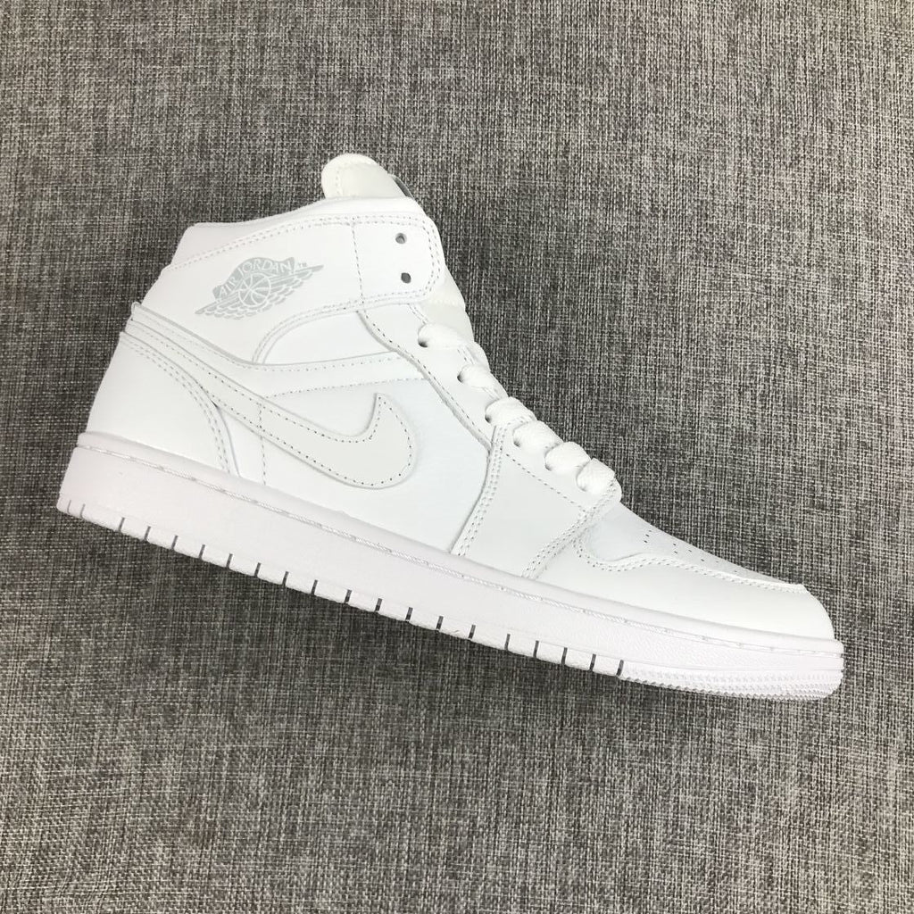 Air Jordan 1 Mid Sneakers in White - product image from the listing.