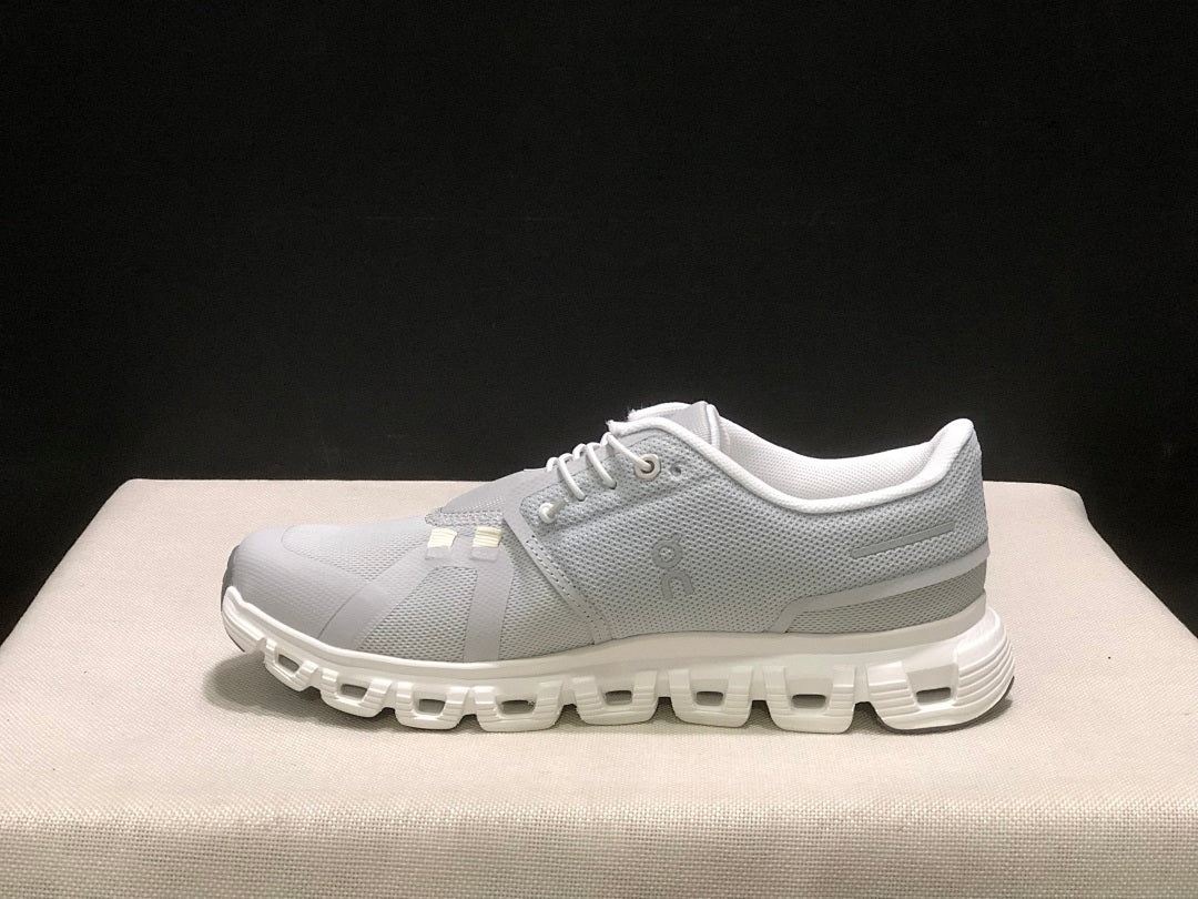 On Cloud 6 Sneakers in Gray and White - product image from the listing.