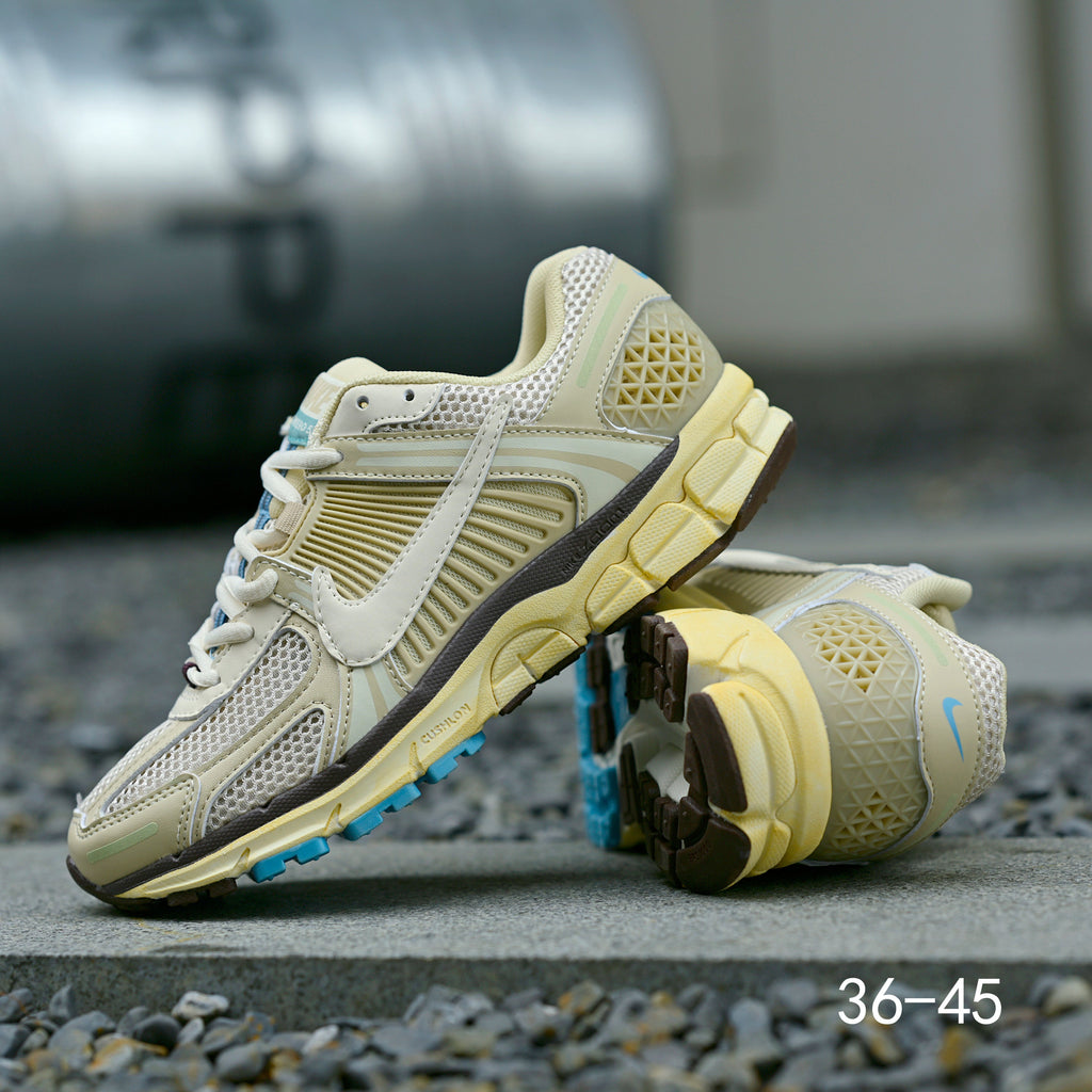 Pale Green and Blue Nike Air Zoom Vomero 5 Sneakers - product image from the listing.