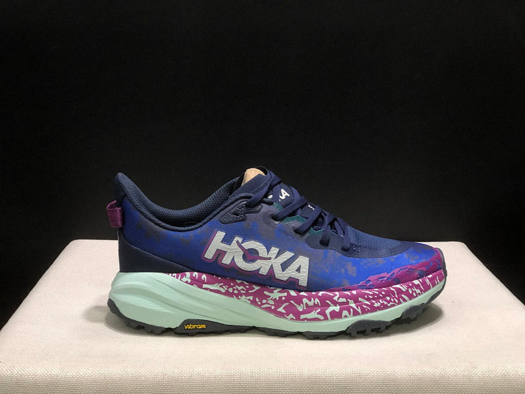 HOKA Speedgoat 6 Trail Running Shoes, in Blue and Pink - product image from the listing.
