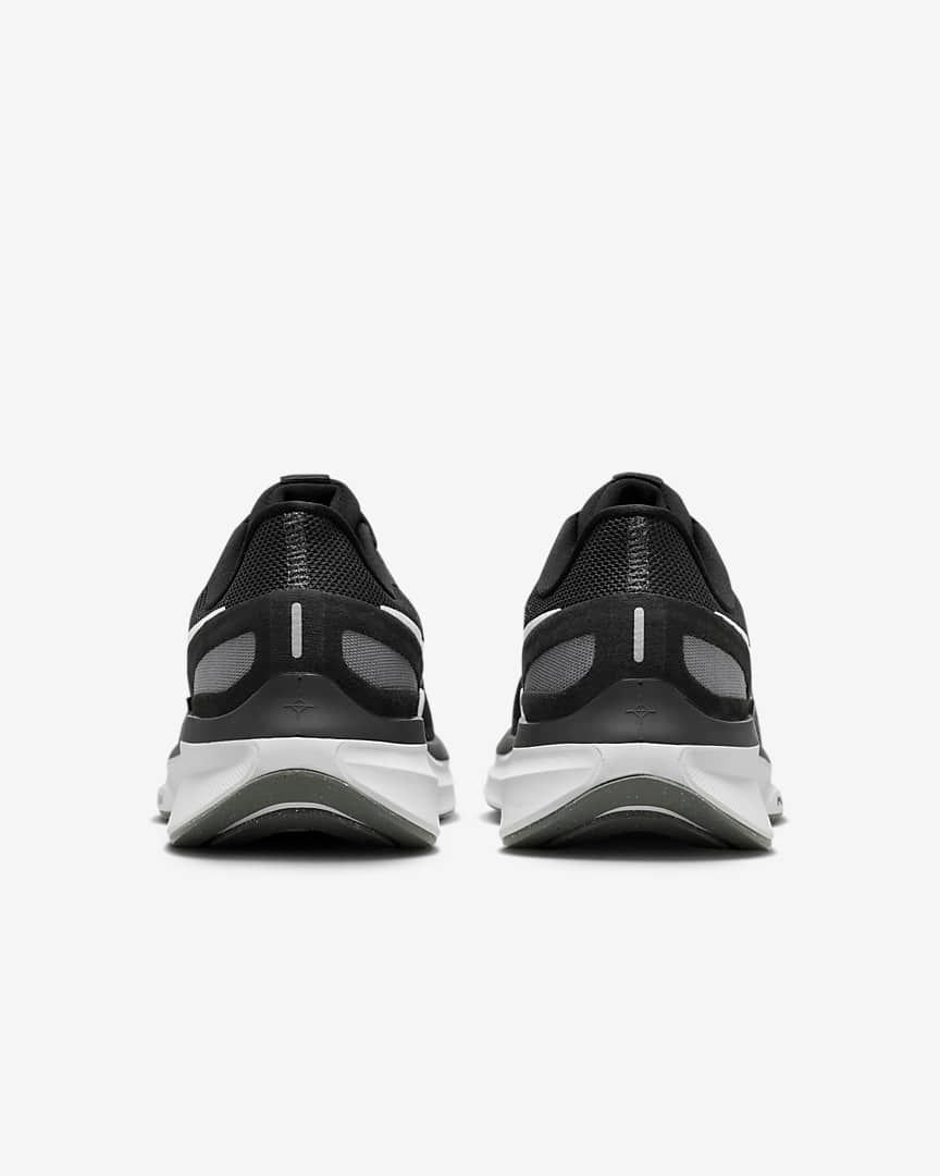 Nike Structure 25 Road Running Shoes in Black DJ7883-002 - product image from the listing.