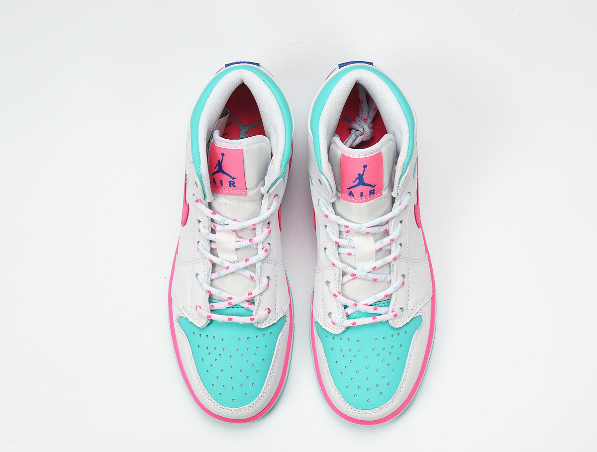 Jordan 1 Mid Sneakers in White Pink Aqua 555112-102 - product image from the listing.