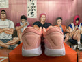 Pink and White Nike Basketball Shoes - product image from the listing.