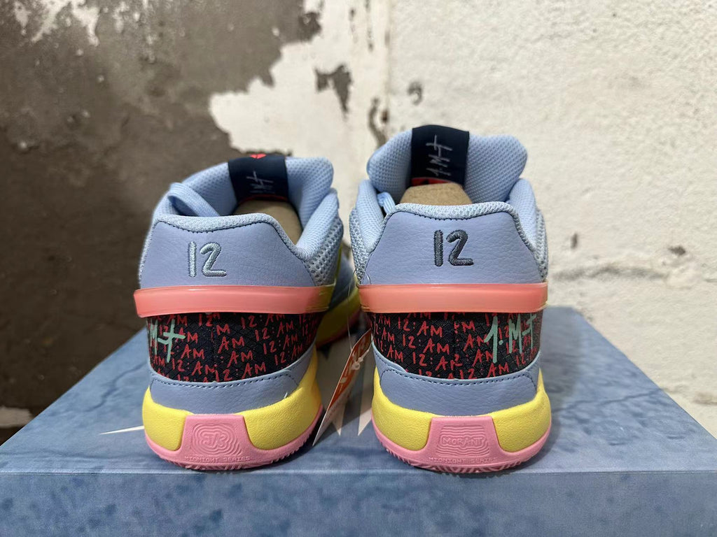Nike Ja 1 Basketball Shoes in Blue Yellow Pink - product image from the listing.