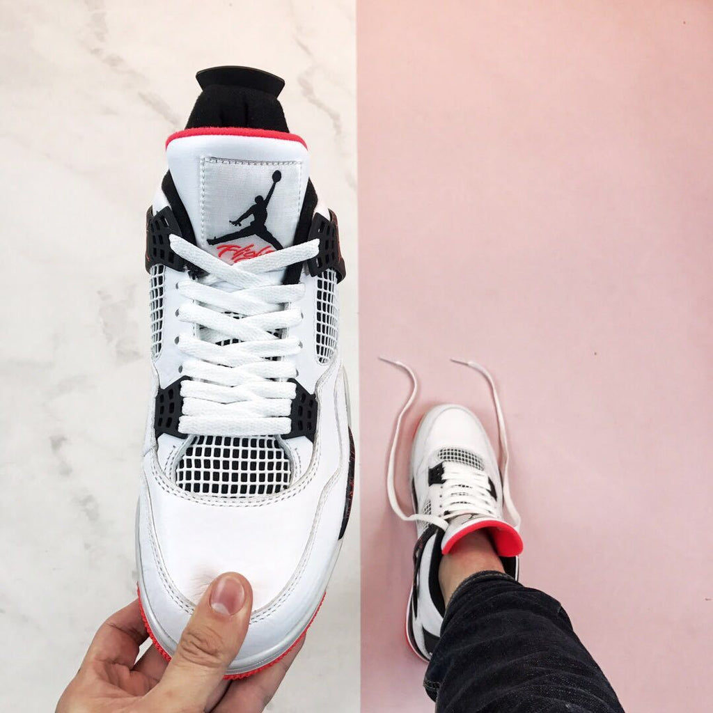 Air Jordan 4 Pale Citron Sneakers White Black Red - product image from the listing.