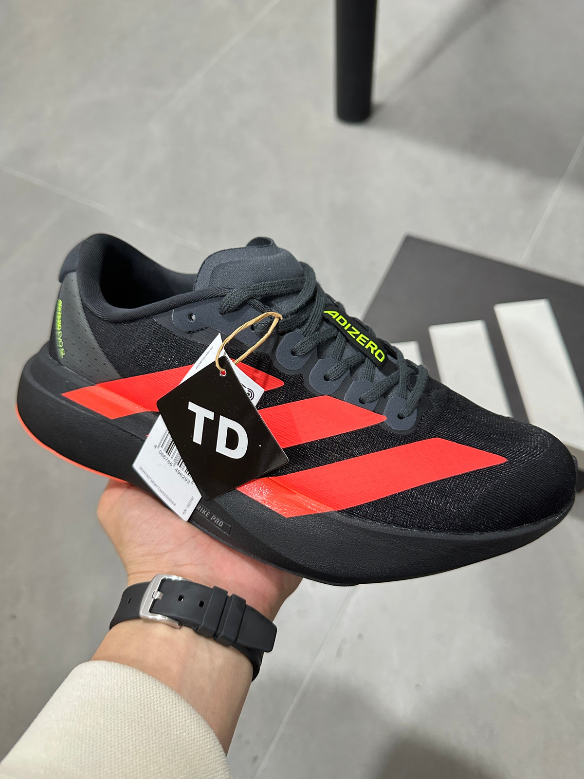 adidas Lightstrike Pro Running Shoes in Black Orange JR3414 - product image from the listing.