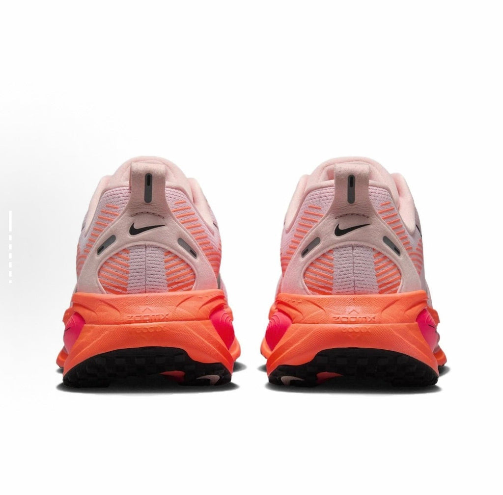 Nike Vomero 18 Running Shoes in Pink Black HM6804-600 - product image from the listing.