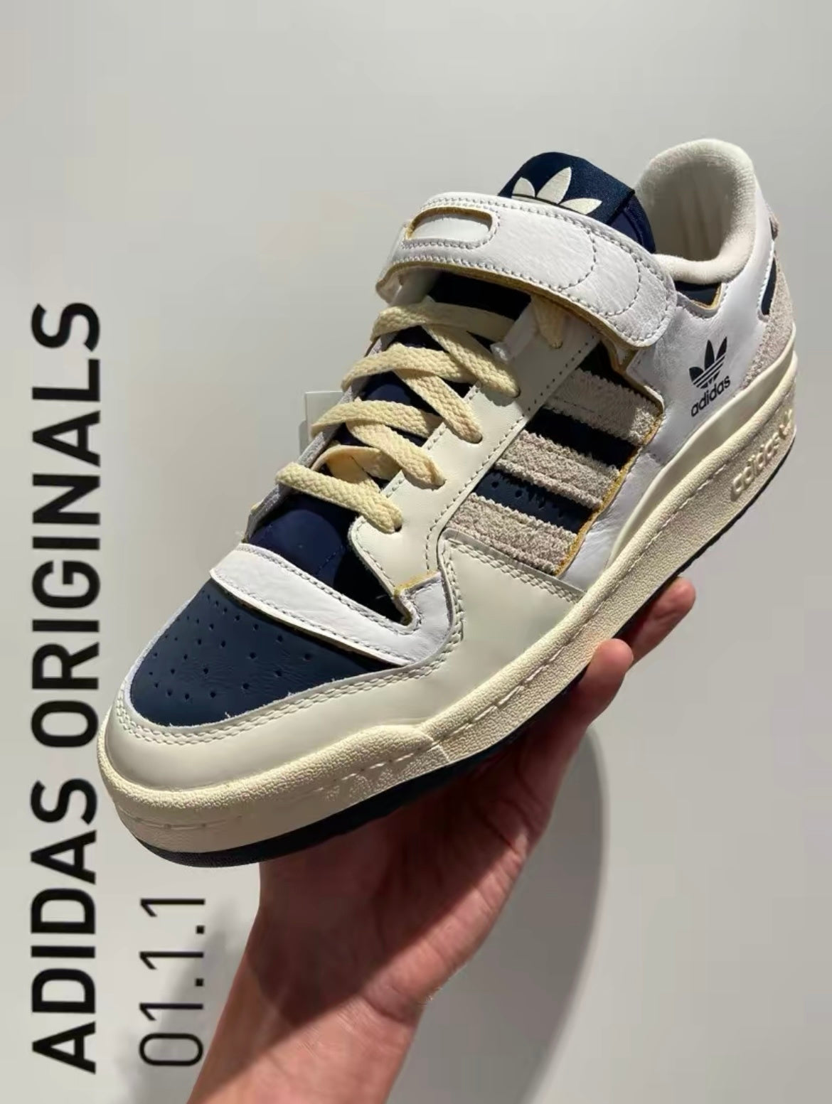 adidas Originals Forum 84 Low Sneakers in White Navy GZ6427 - product image from the listing.