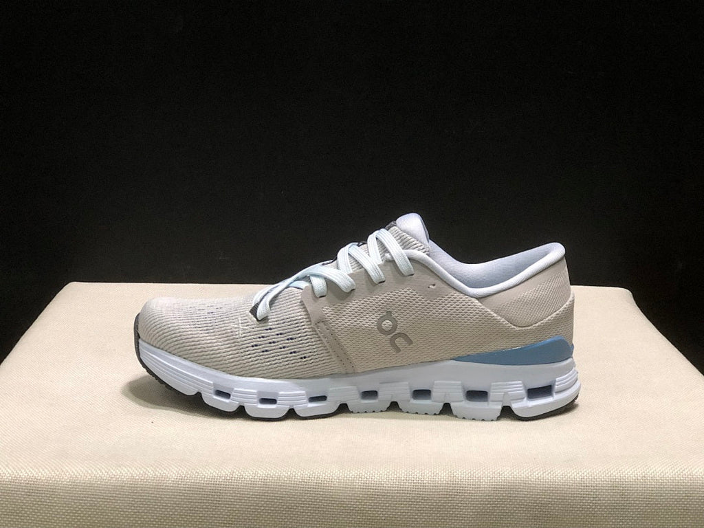 Silver and Blue On Cloud X 4 Sneakers - product image from the listing.