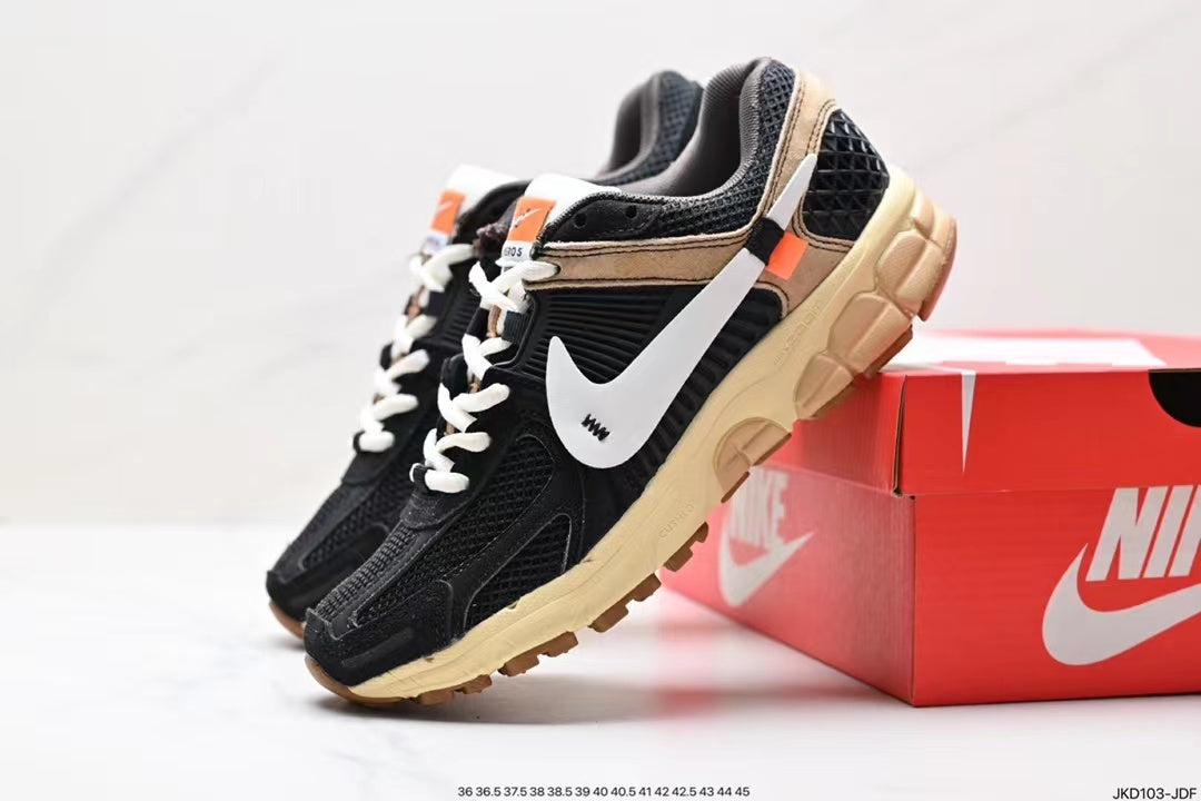 Nike Air Zoom Vomero 5 Running Shoes in Black and Beige - product image from the listing.