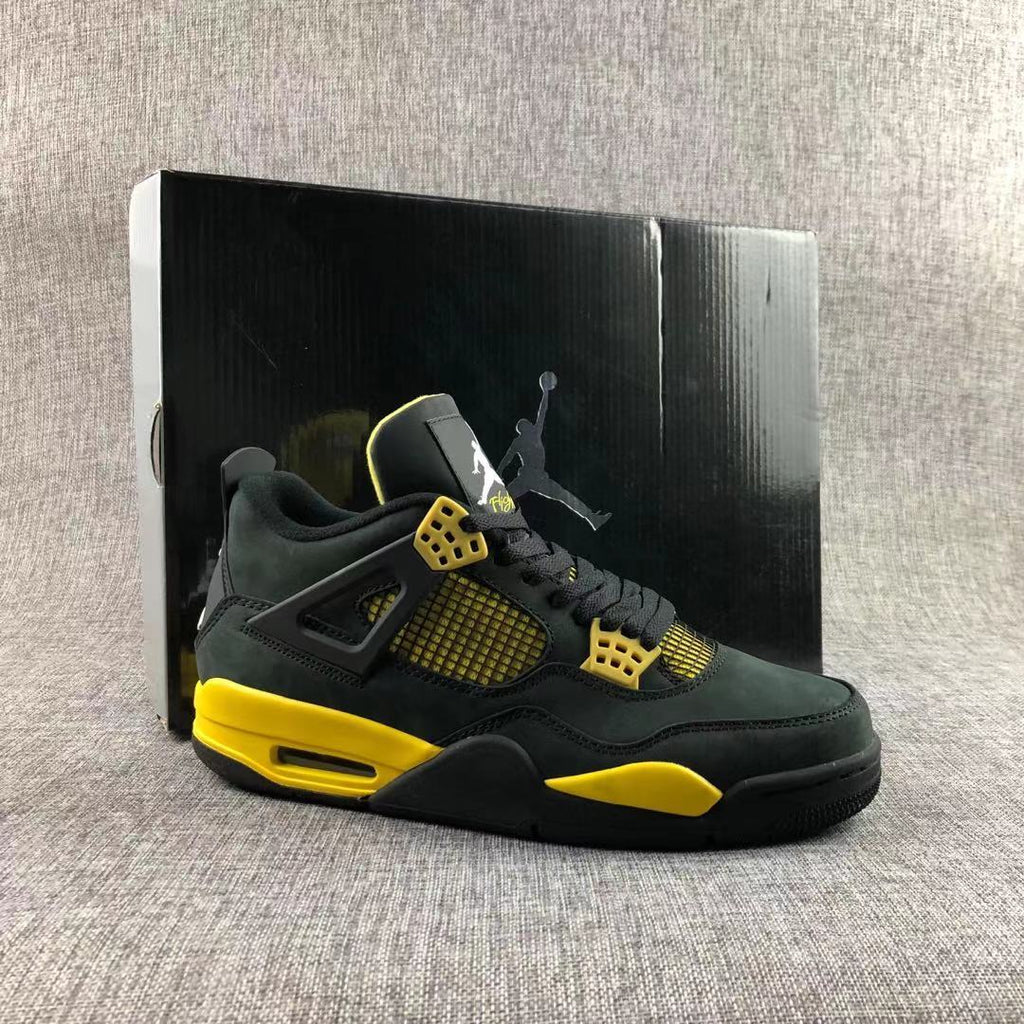 Air Jordan 4 Thunder Black Yellow Sneakers - product image from the listing.