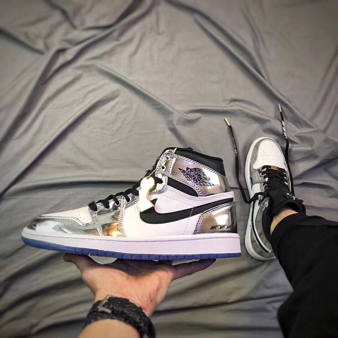Air Jordan 1 Pass The Torch High-Top Sneakers Silver White - product image from the listing.