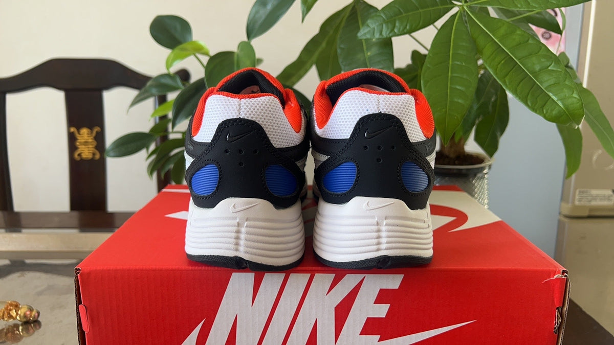 Nike P-6000 Sneakers in White Black Blue CD6404-008 - product image from the listing.