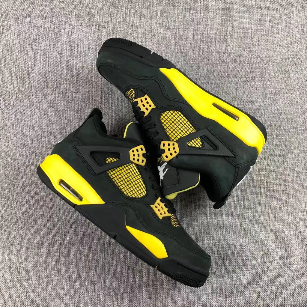 Air Jordan 4 Thunder Black Yellow Sneakers - product image from the listing.