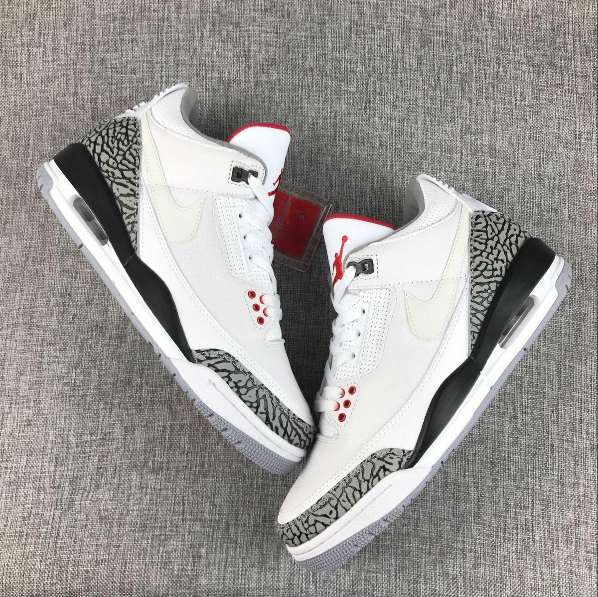 White Cement Sneakers - Air Jordan 3 Retro - product image from the listing.
