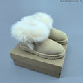 Women's UGG Tazzelle Fur-Trimmed Platform Slippers - product image from the listing.