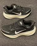 Nike Vomero 18 Running Shoes in Black White HM6803-007 - product image from the listing.
