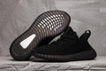 Yeezy 350 V2 Sneakers in Black Knit - product image from the listing.