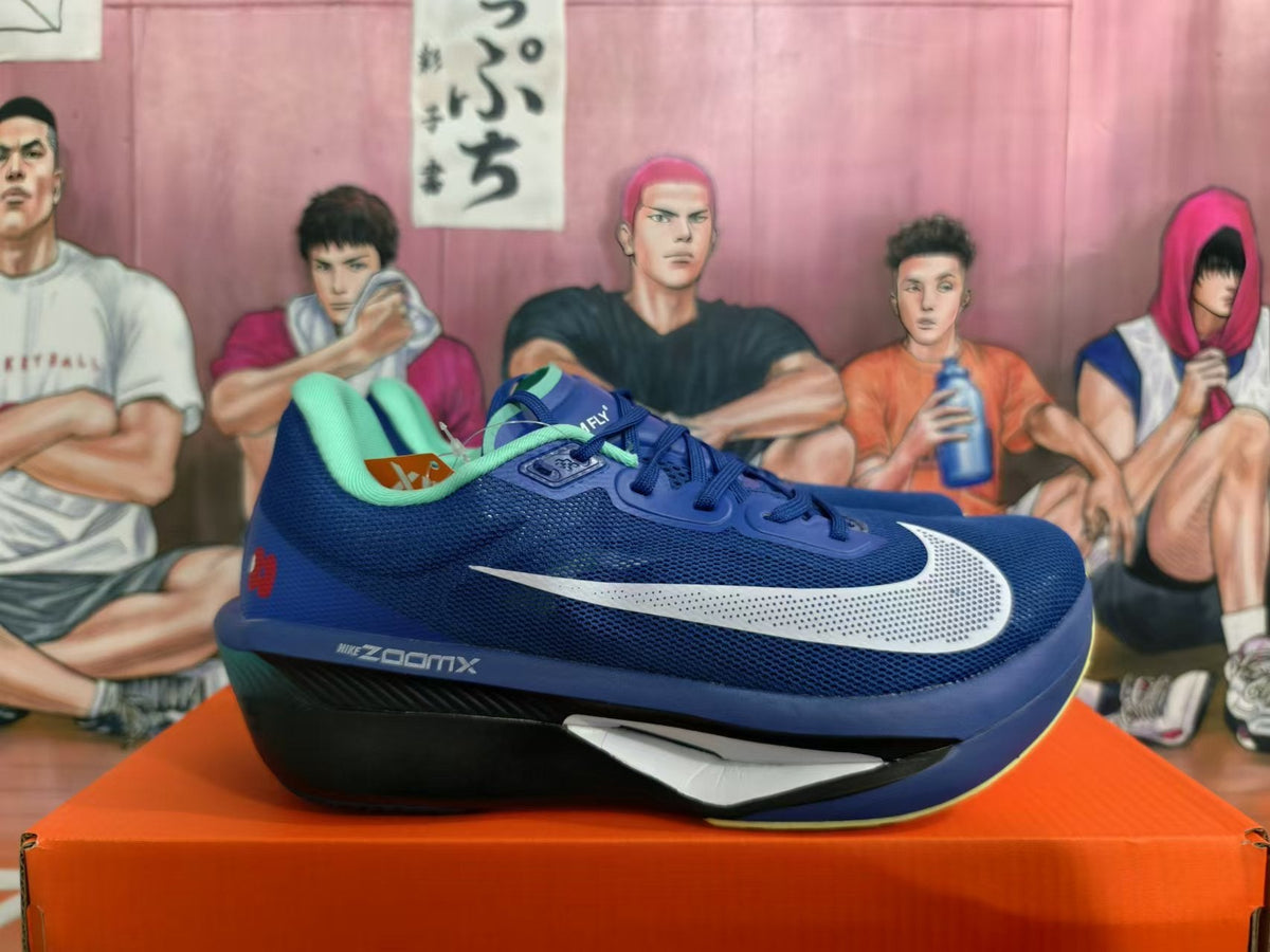 Nike ZoomX Running Shoes in Blue, in Black and Mint - product image from the listing.