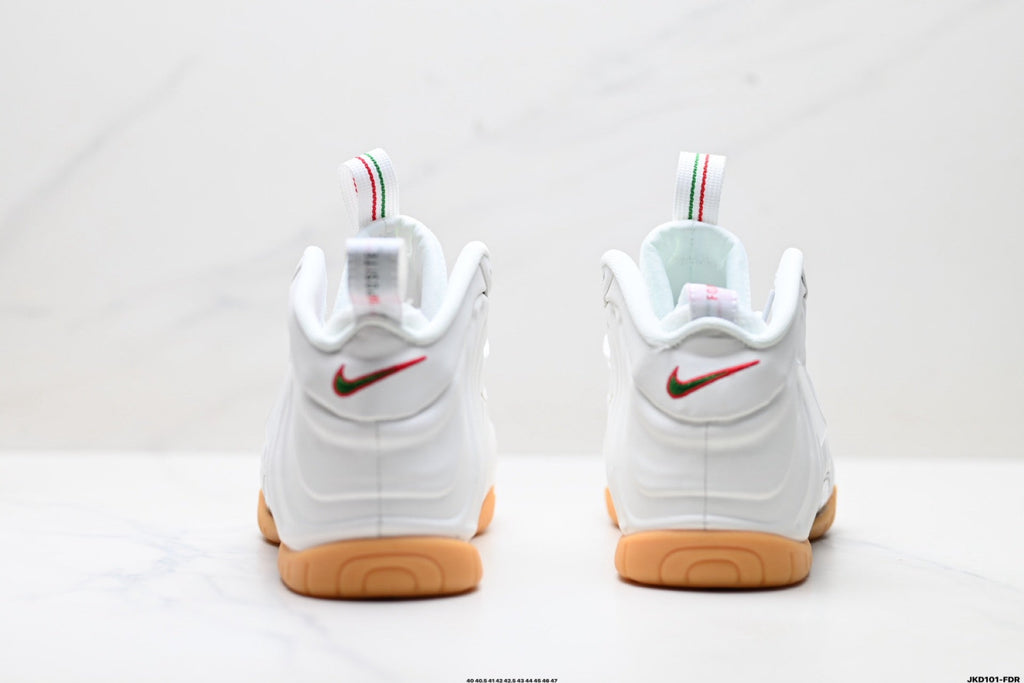 Nike Air Penny Foamposite Sneakers in White and Gum - product image from the listing.