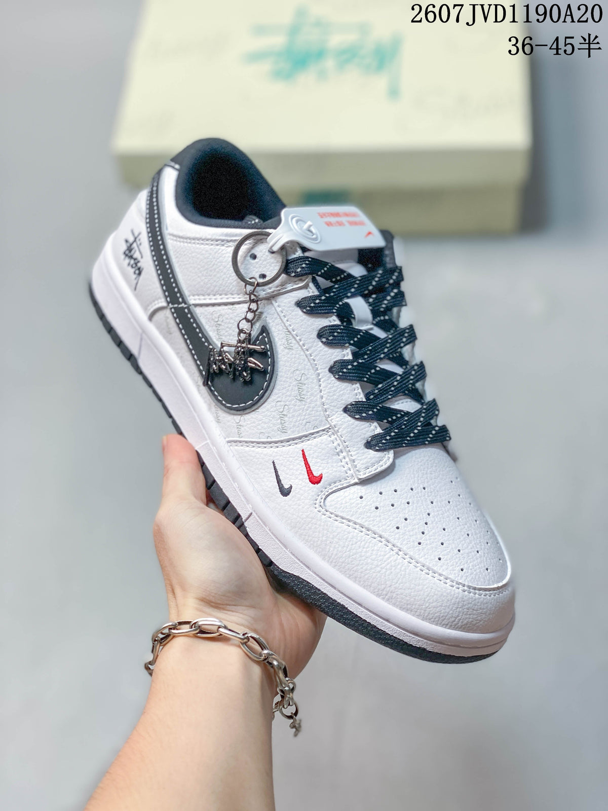Nike SB Dunk Low Stüssy Sneakers in White Black - product image from the listing.