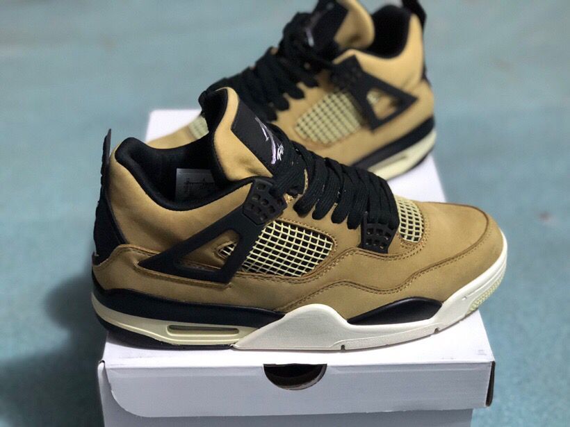 Jordan 4 Retro Sneakers in Tan Black - product image from the listing.