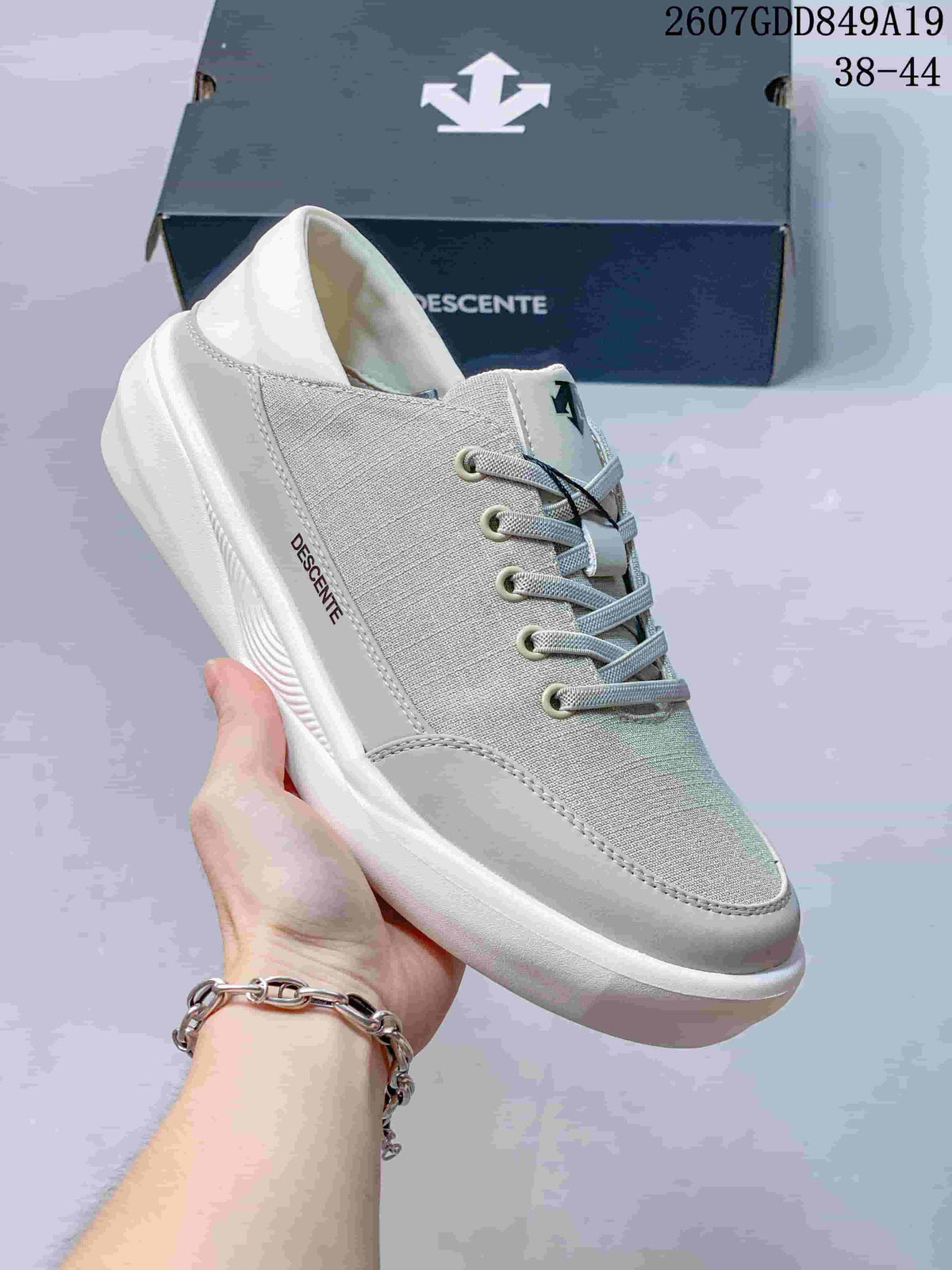 White and Gray Descente 2607GDD849A19 Low-Top Sneakers - product image from the listing.
