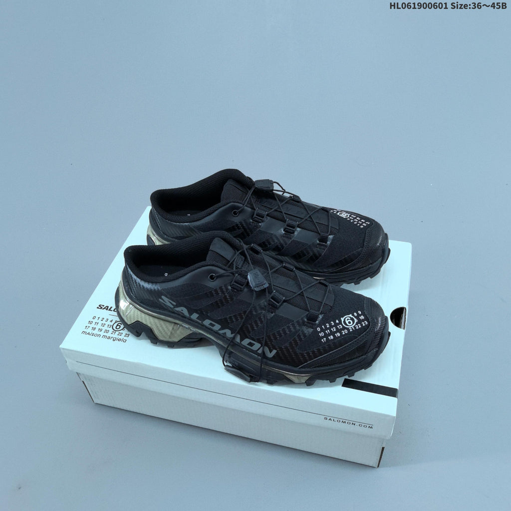 Black and Silver Salomon XT-4 Mule Sneakers - product image from the listing.