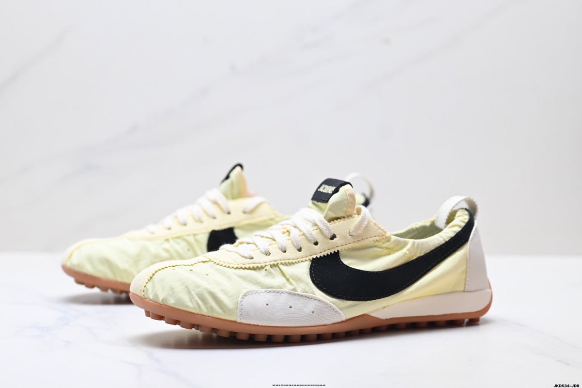Pale Yellow and Black Nike x Jacquemus Sneakers - product image from the listing.