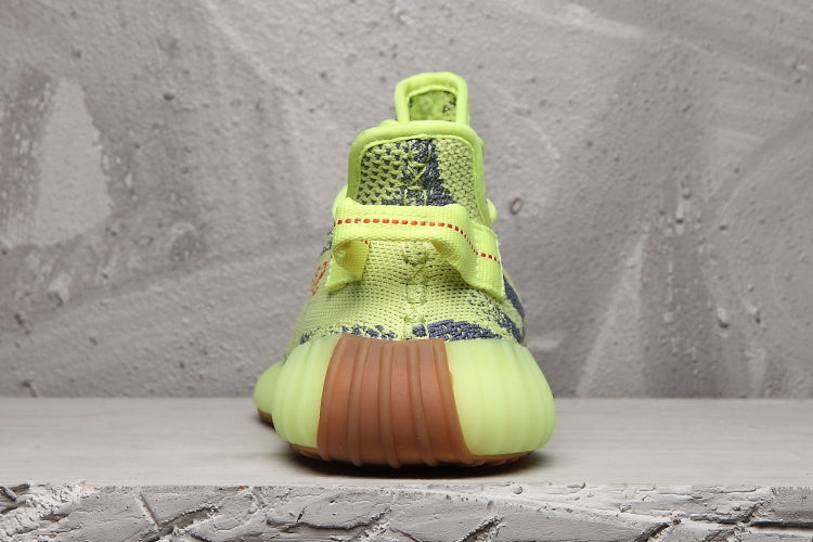 Lime Green and Brown Yeezy Boost 350 V2 Sneakers - product image from the listing.